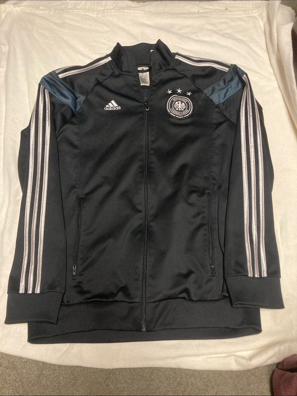 adidas Black Track Jacket with White Stripes and Blue Shoulder Accents